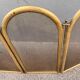 Antique brass fireplace screen from 1920, vintage spark guard.