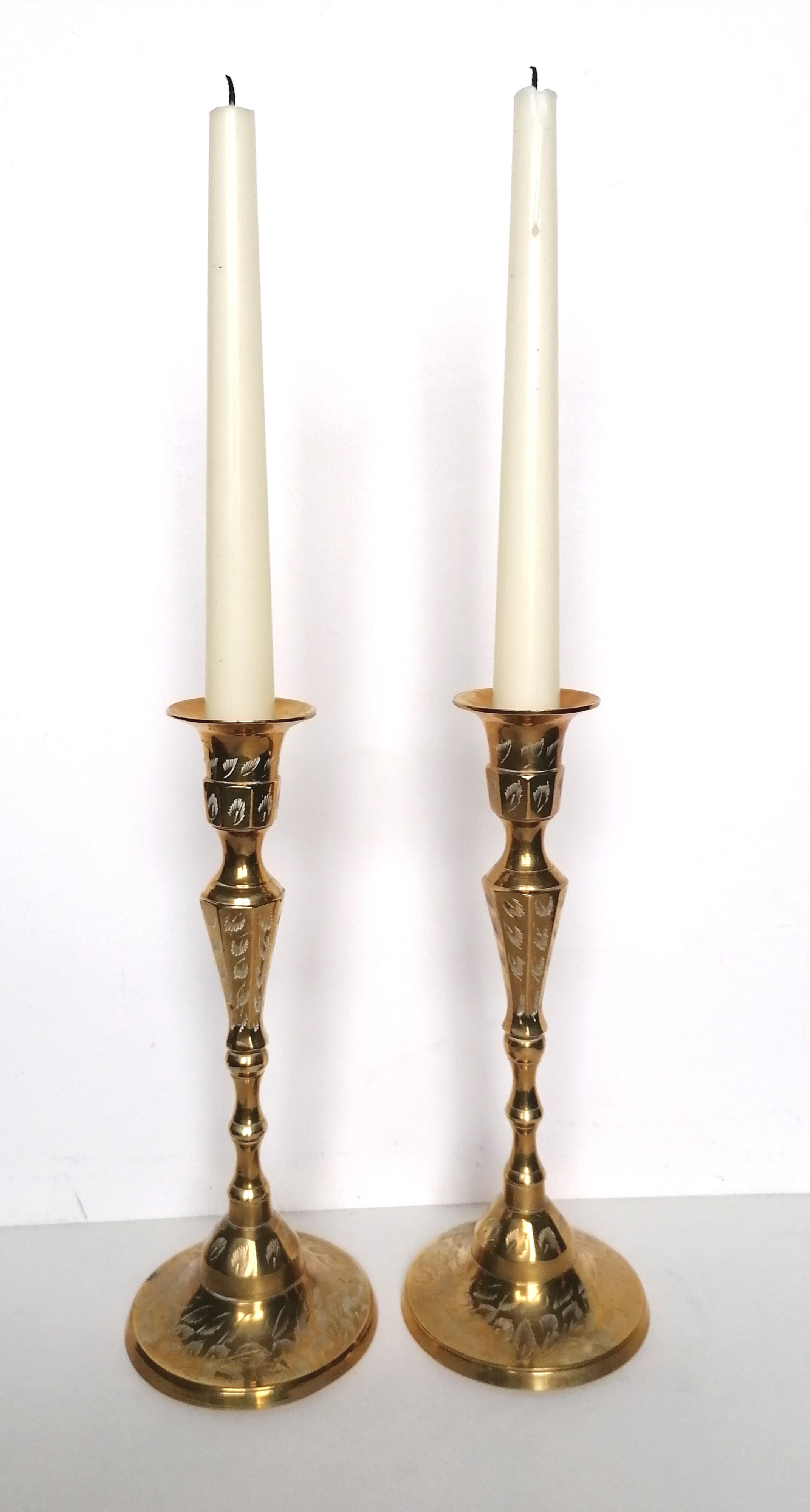 Pair of brass candle holders year 40