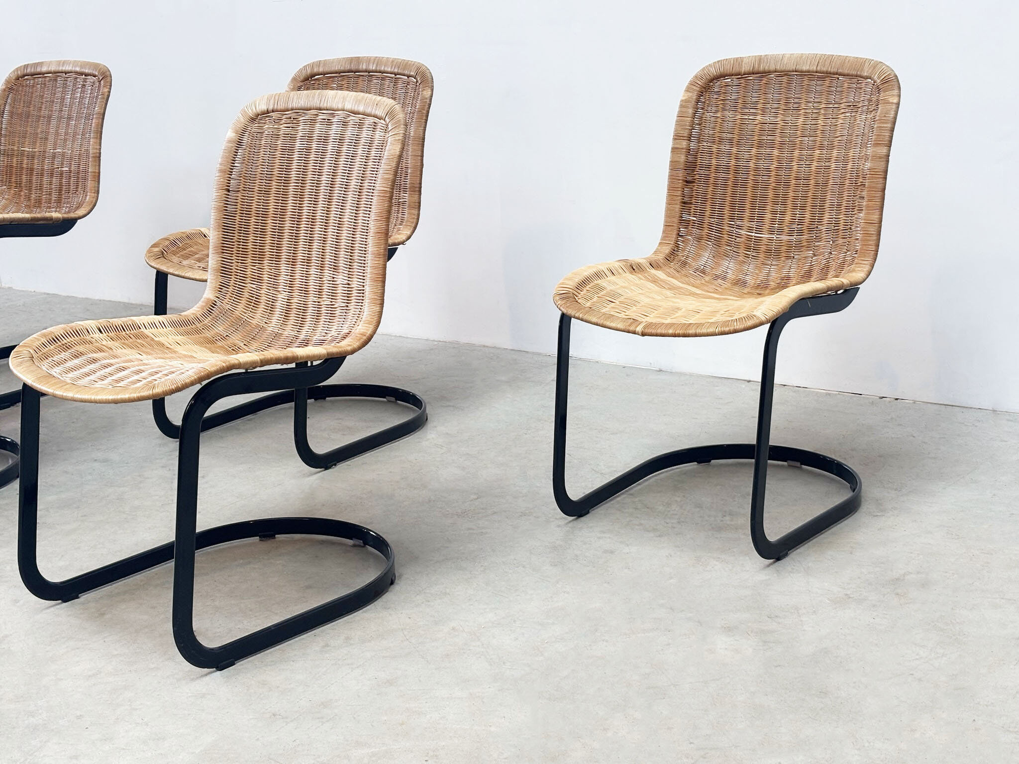 Set of six Cidue rattan dining chairs
