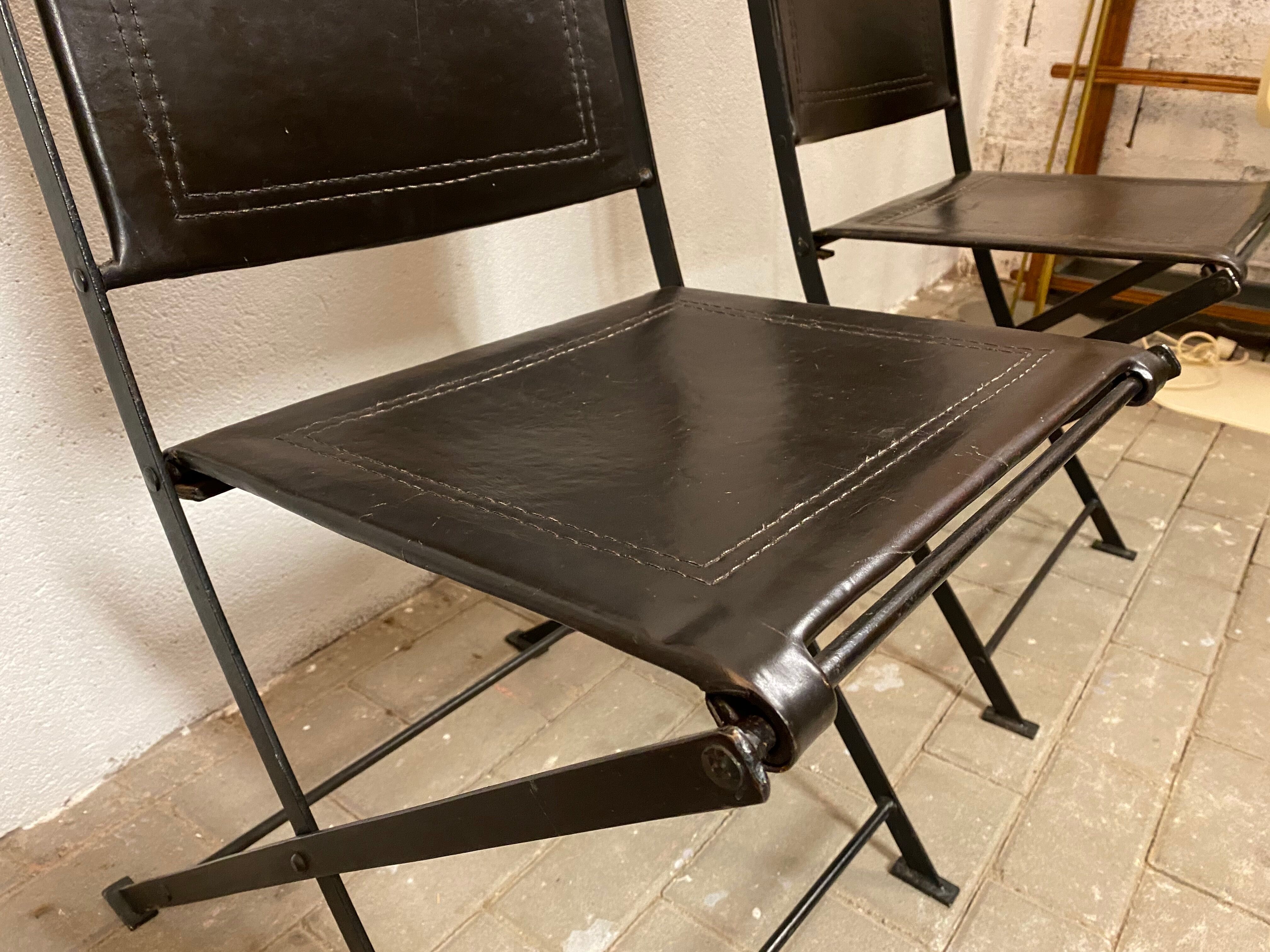 1950s vintage iron folding chairs and leather