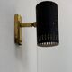 Vintage adjustable wall light, brass and matte black metal, France, 1960.