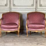 Pair of Louis XV style bergère armchairs in carved wood, pink velvet, circa 1900