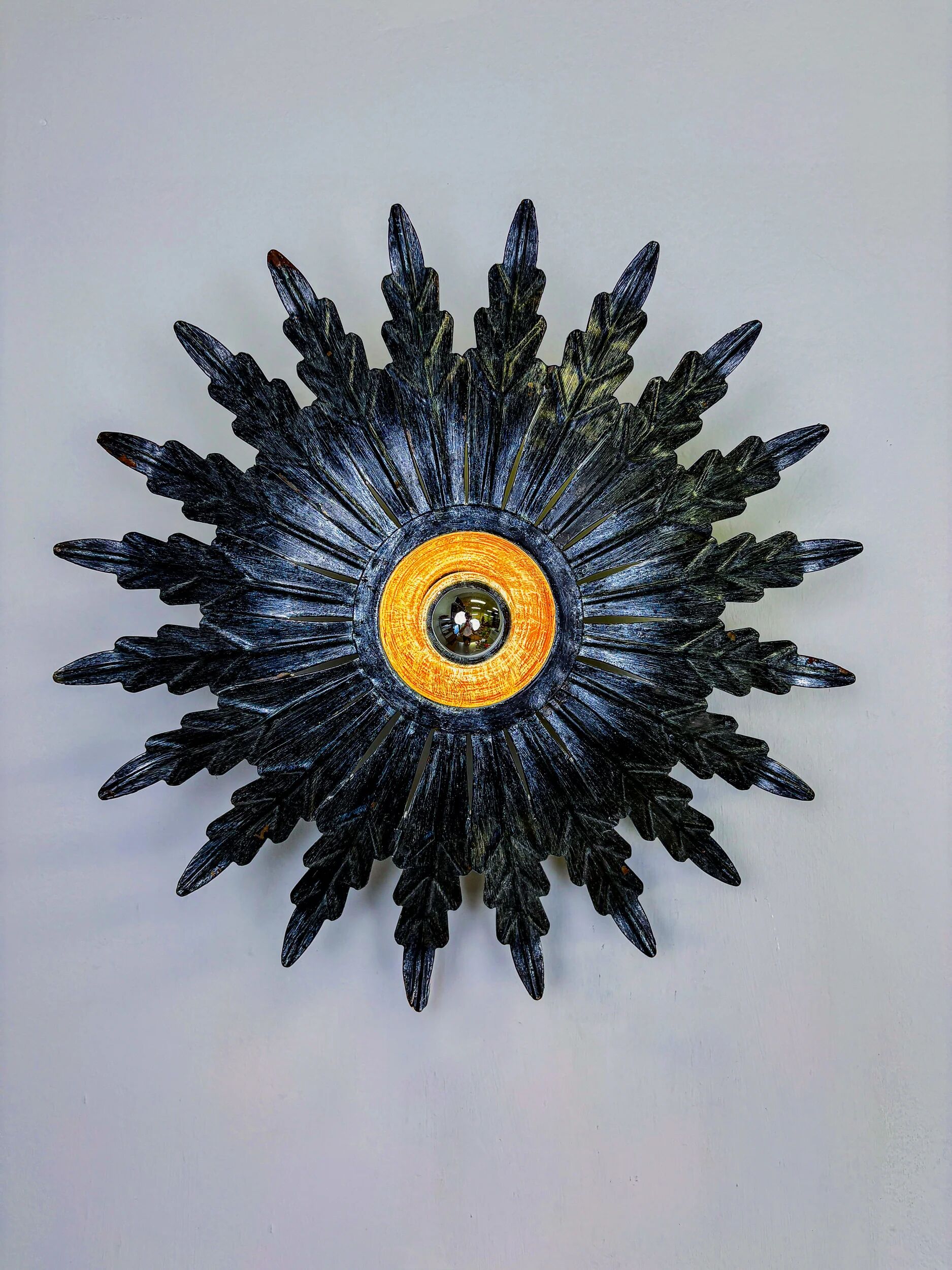 Spanish sunburst ceiling light – dark gilt metal rays, 1950s