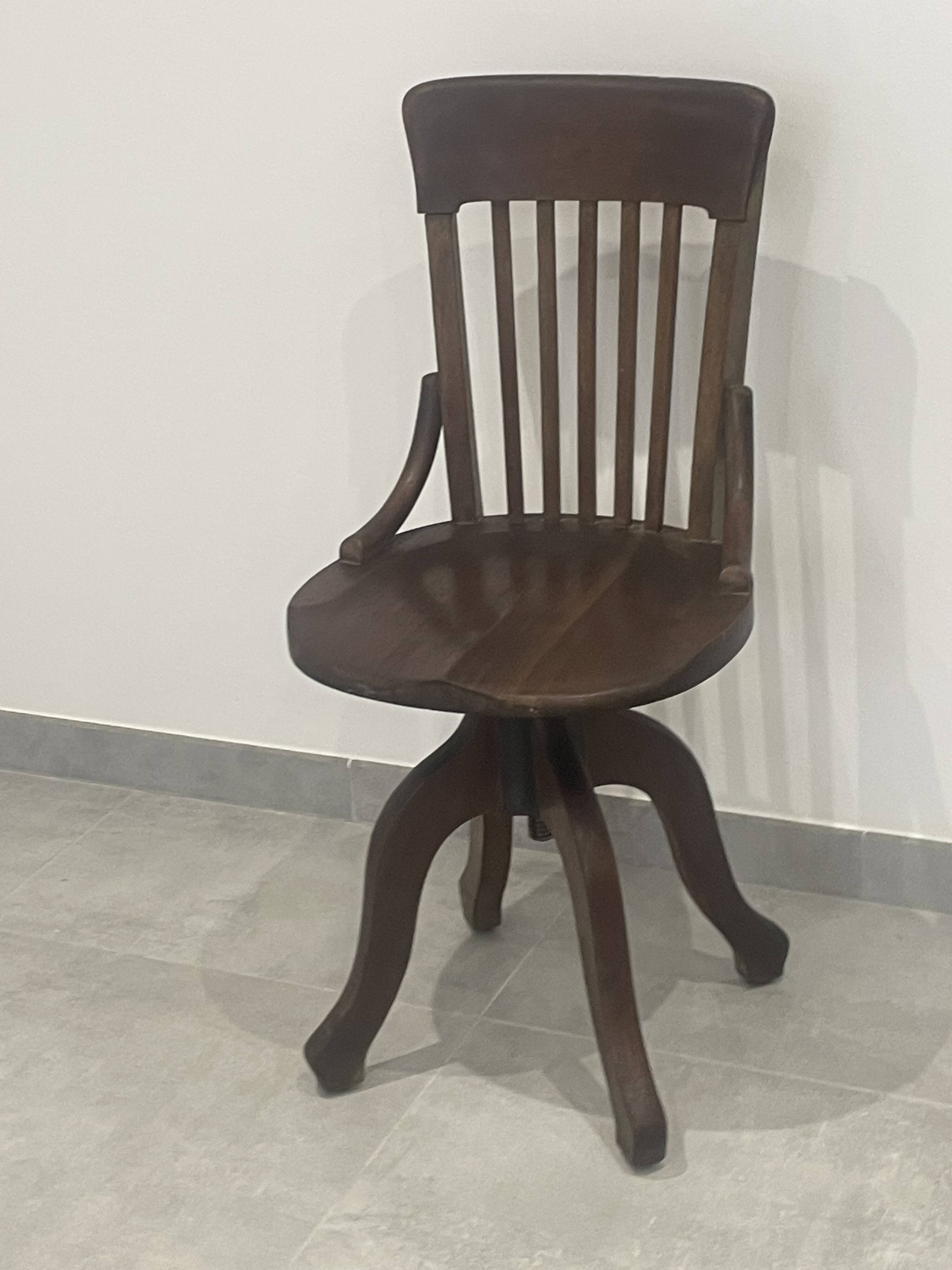 Baumann 1920 rotating office chair with adjustment screw