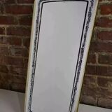 Rearview mirror and screen-printed with gold outline and black edging