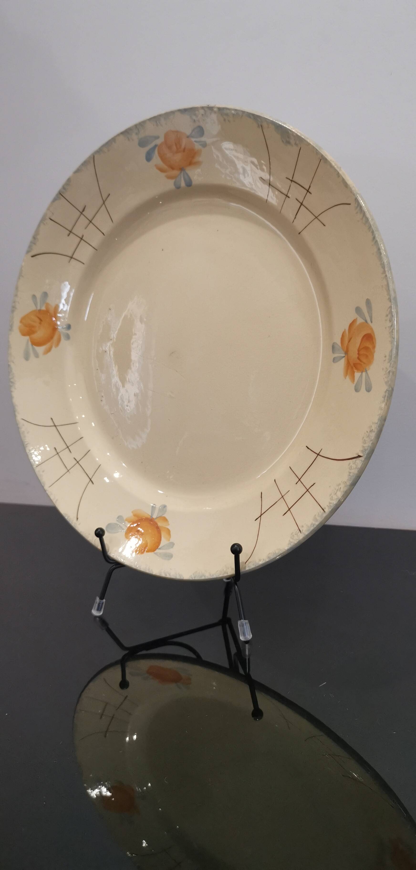 Old Terre de fer earthenware dish, hand painted