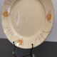 Old Terre de fer earthenware dish, hand painted
