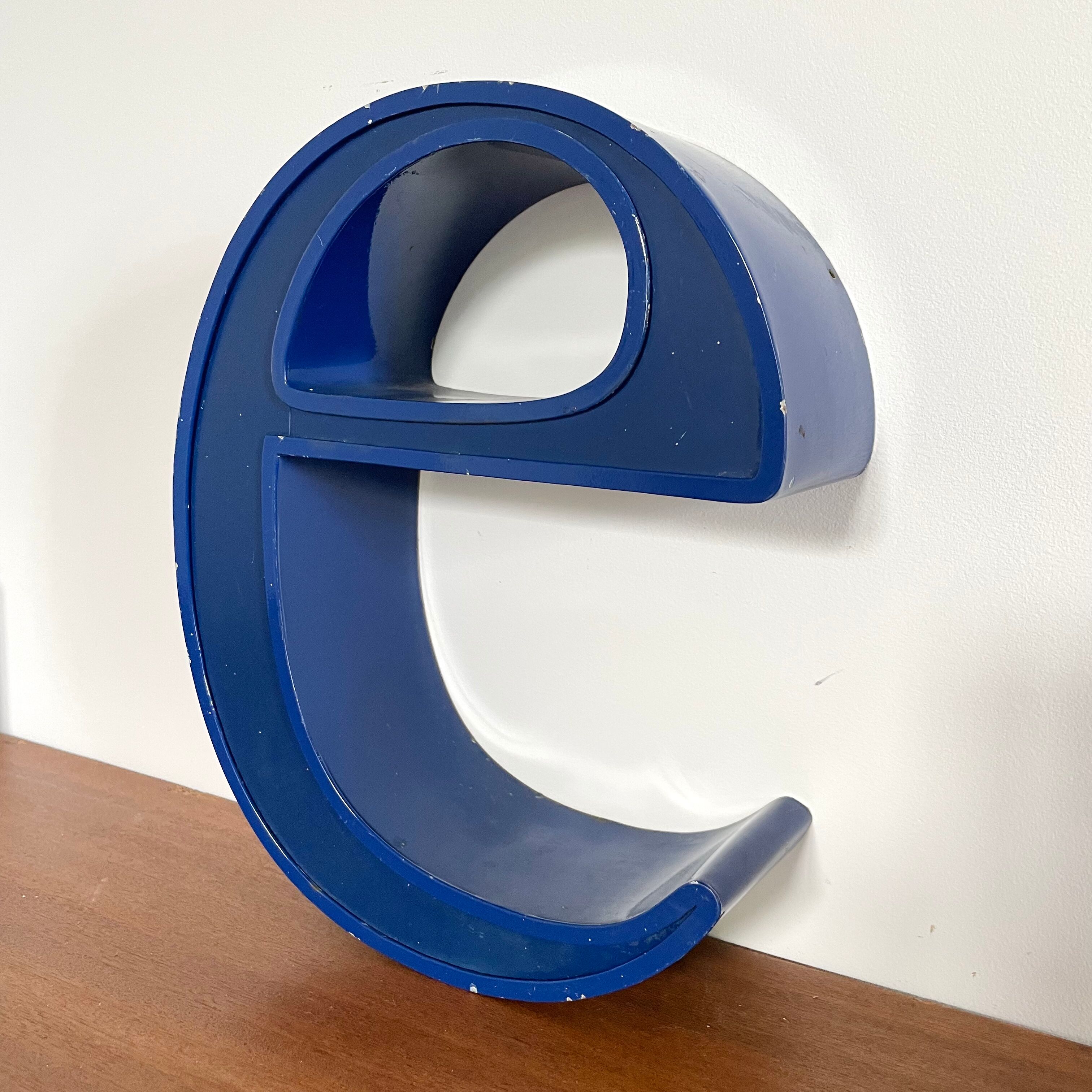 Vintage metal sign letter