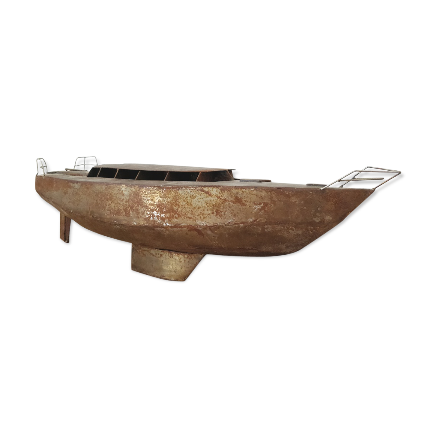 Vintage boat model in patinated metal