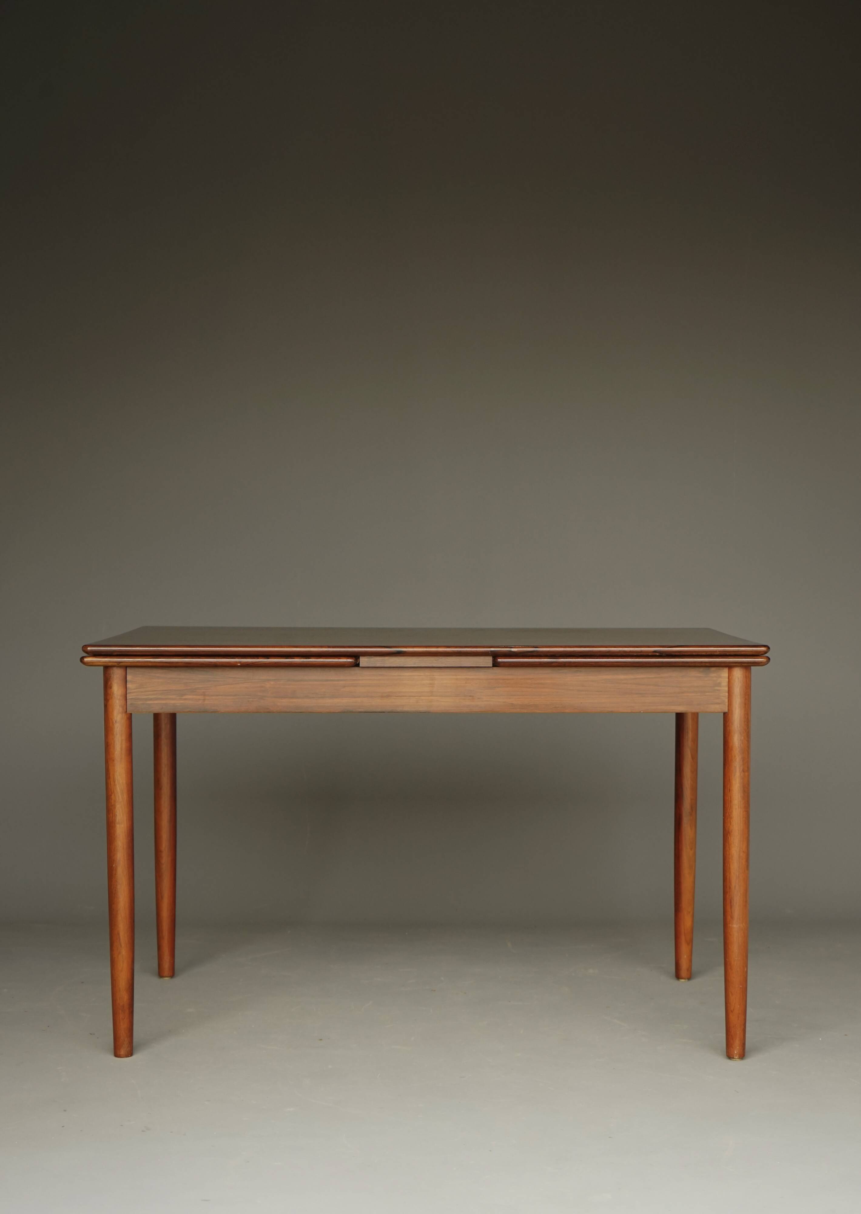 Scandinavian Rosewood extendable Dining Table. 1960s