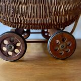 Old wicker dolls' pram - wooden wheels