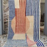 Béni Ouarain rug with stripes and geometric patterns