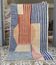 Tapis Béni Ouarain à rayures et motifs géométriques