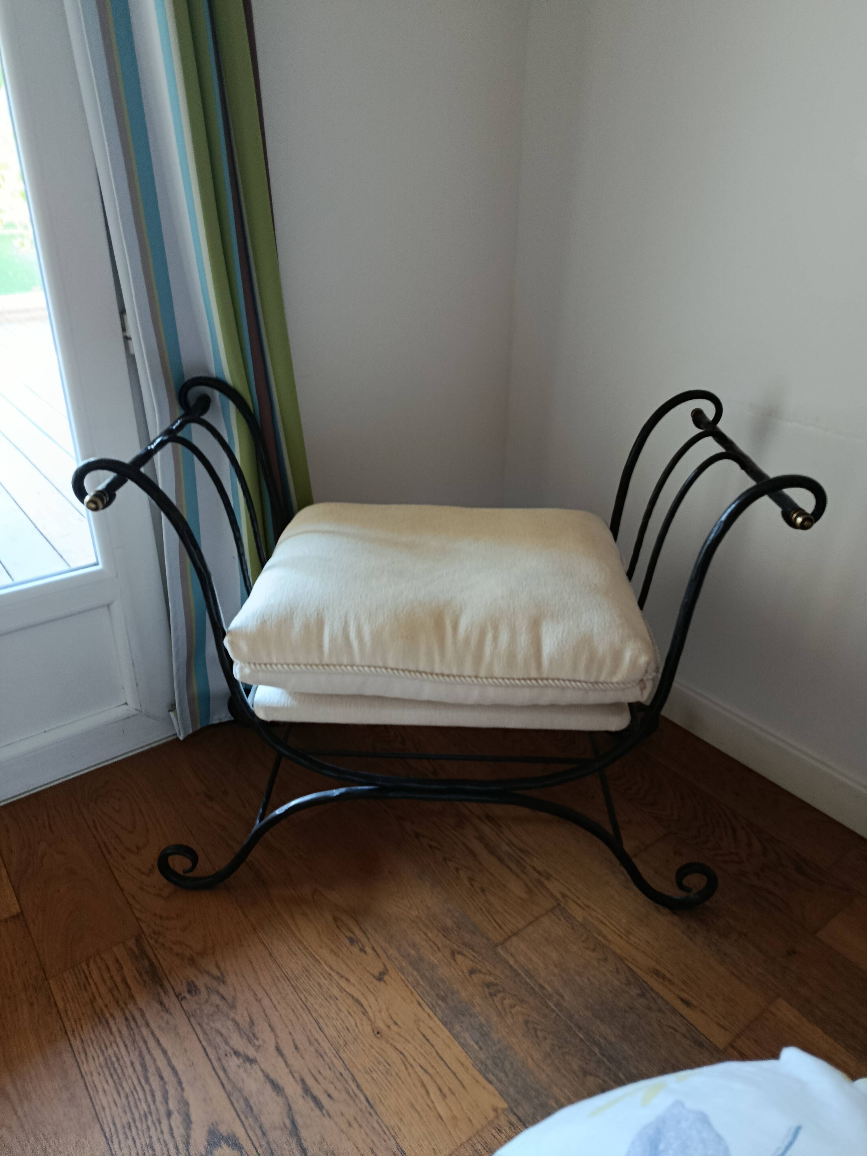 Artistic wrought iron pouf design