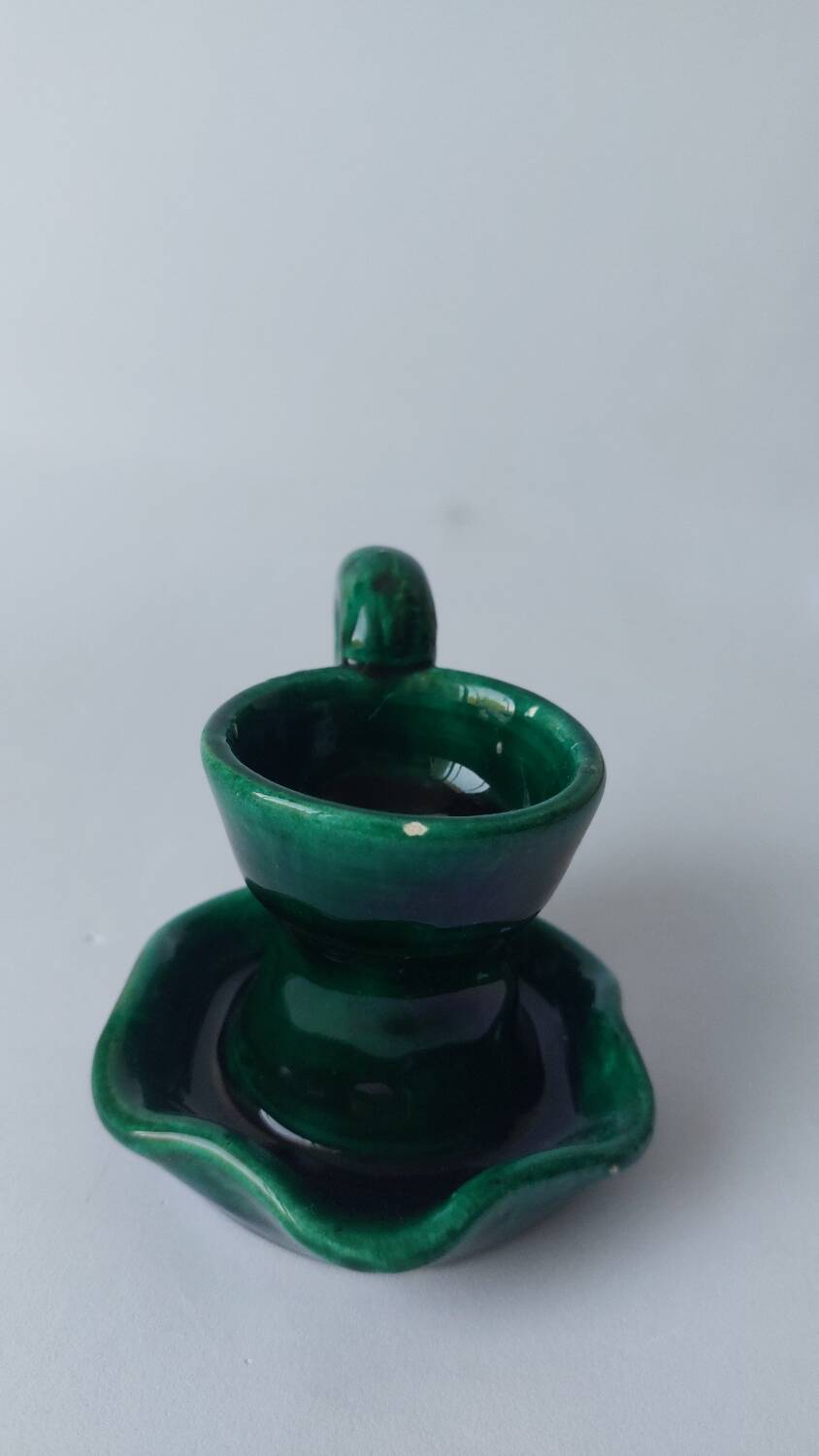 Green ceramic candlestick holder