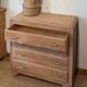 Vintage oak commode with tapered legs.