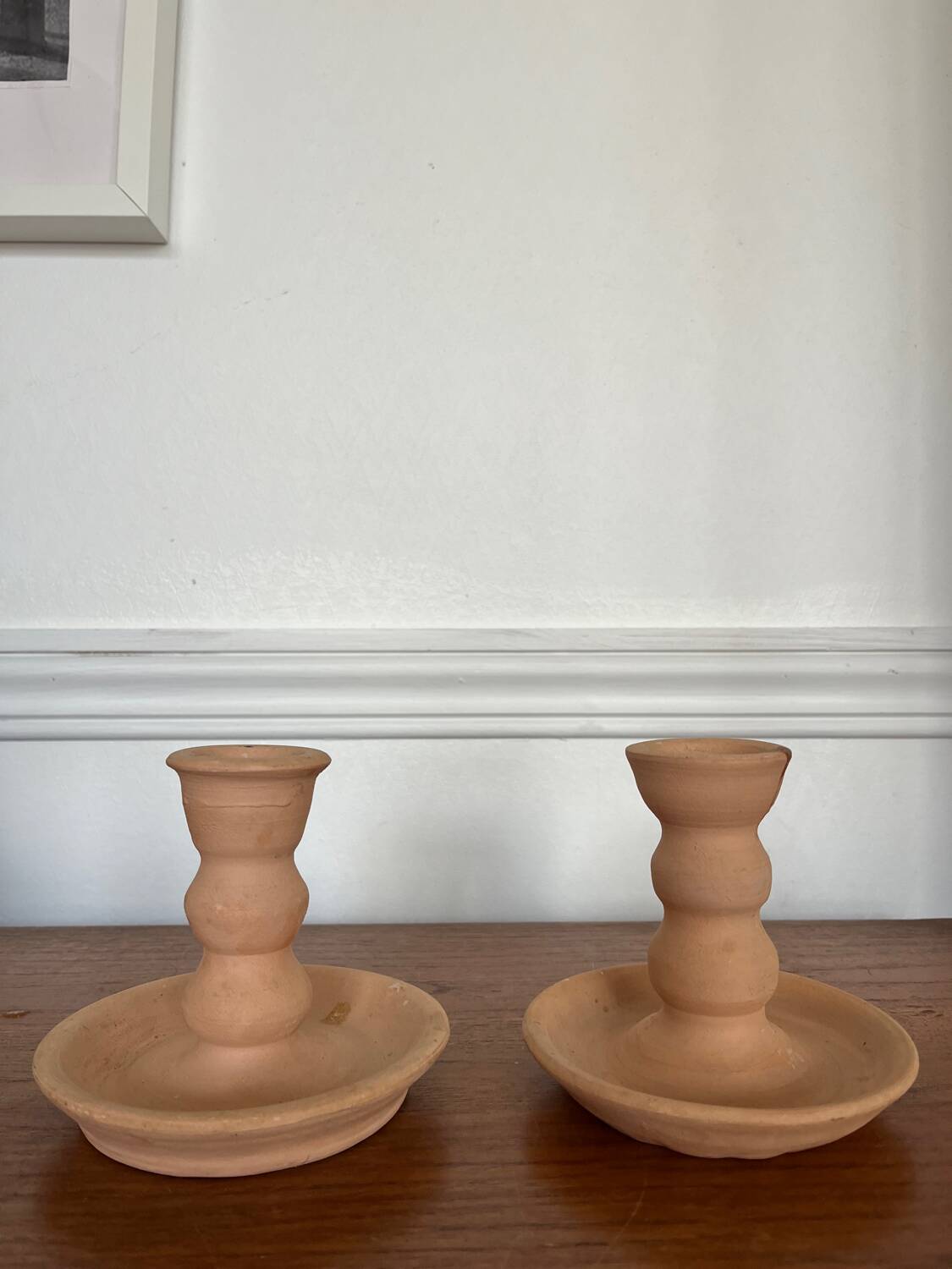 Pair of terracotta candlesticks