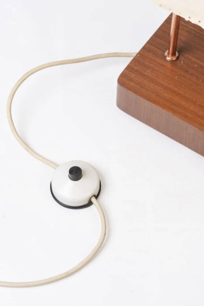 Wood and copper metal floor lamp with parchment.