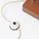 Wood and copper metal floor lamp with parchment.
