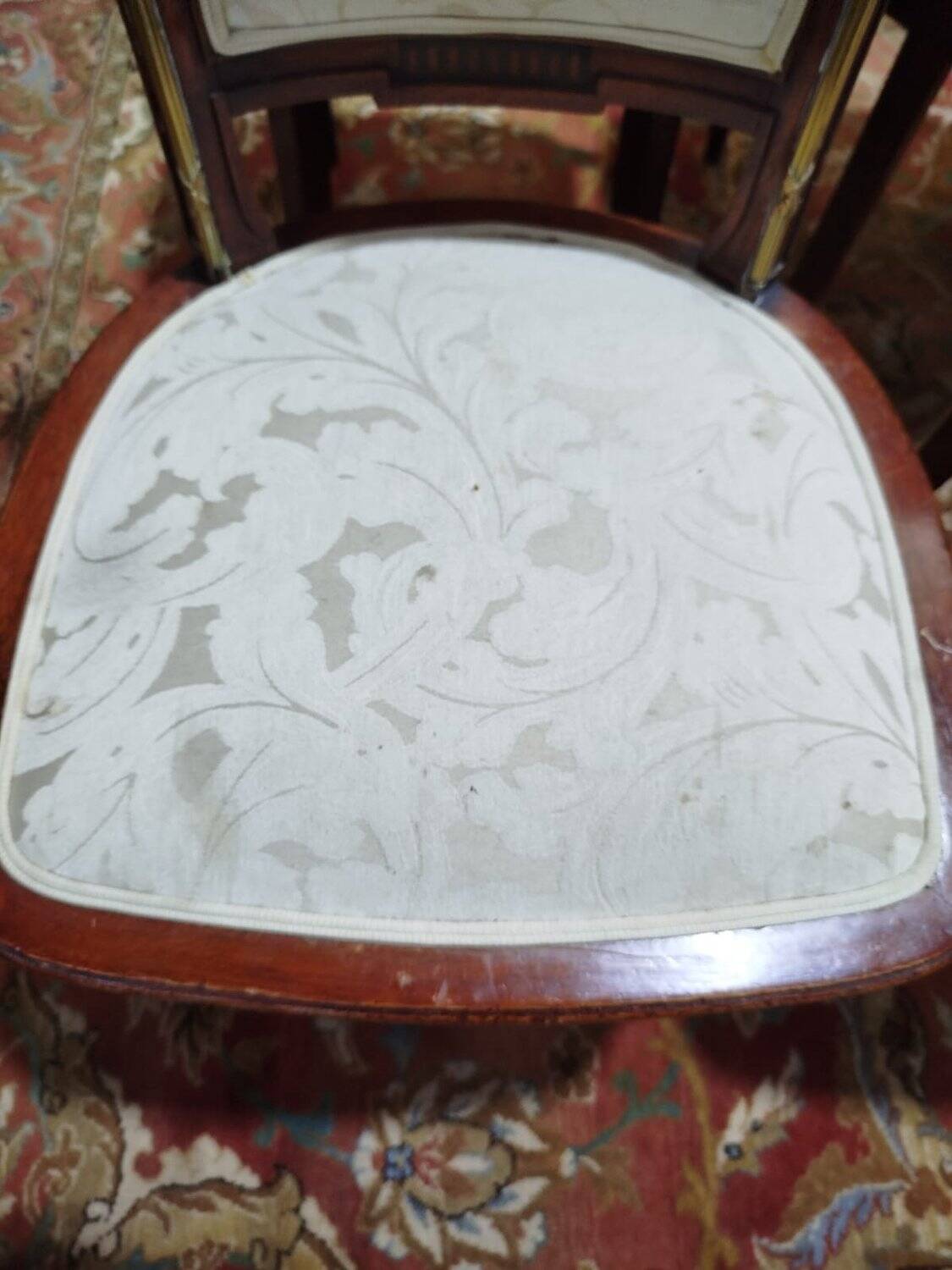 Suite de 8 chaises et paire de fauteuils Louis XVI