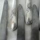 Box of 12 silver-plated art nouveau knives with steel blades