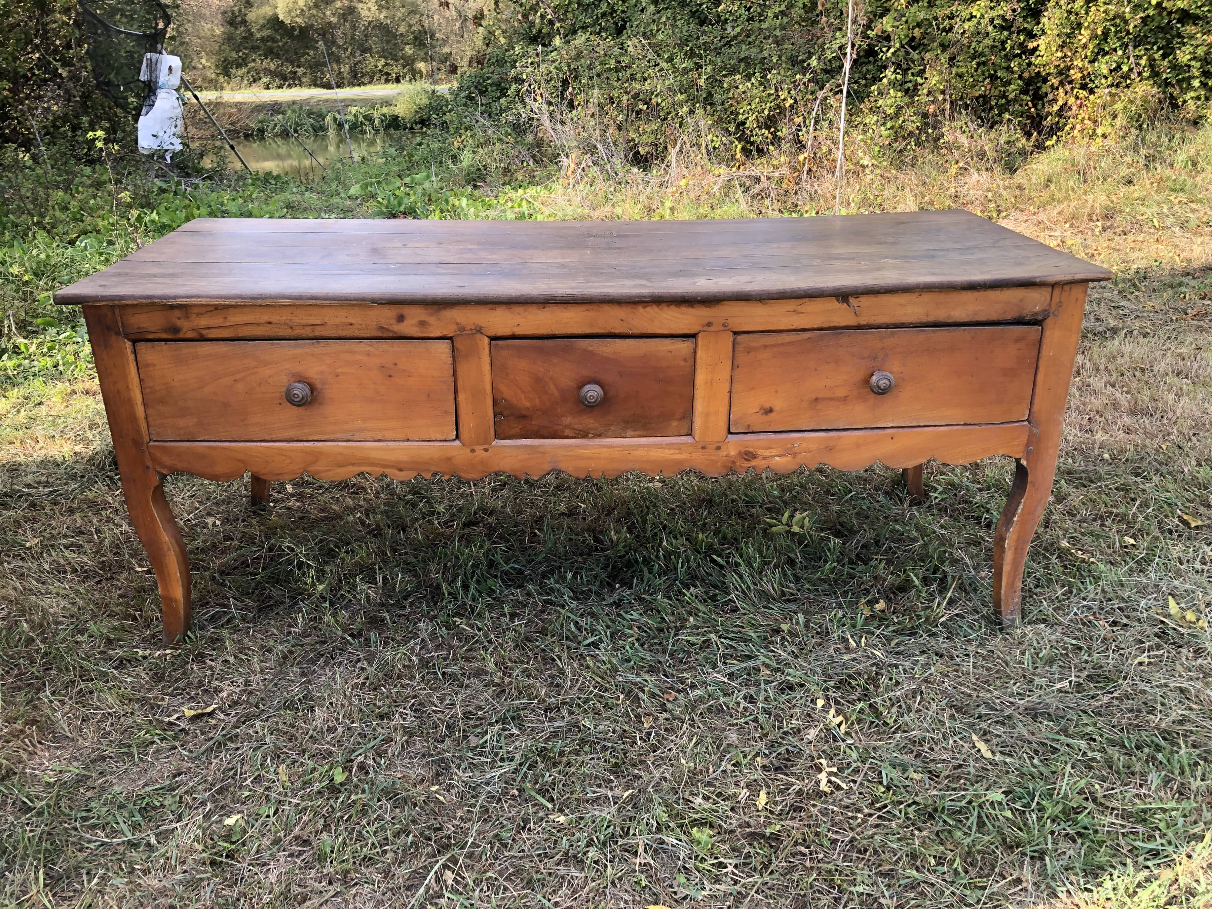 Antique Louis XV paneled table with 3 front drawers in solid cherry wood