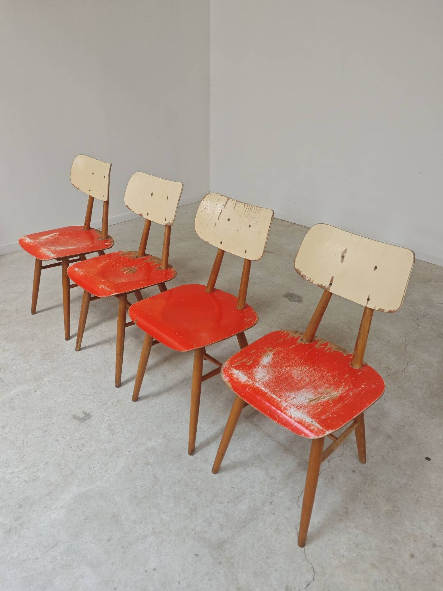 Set of 4 Ton (Thonet) red wooden chairs from the 1960s.