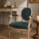 Louis XVI cabriolet armchair in blue velvet and wood, restored.