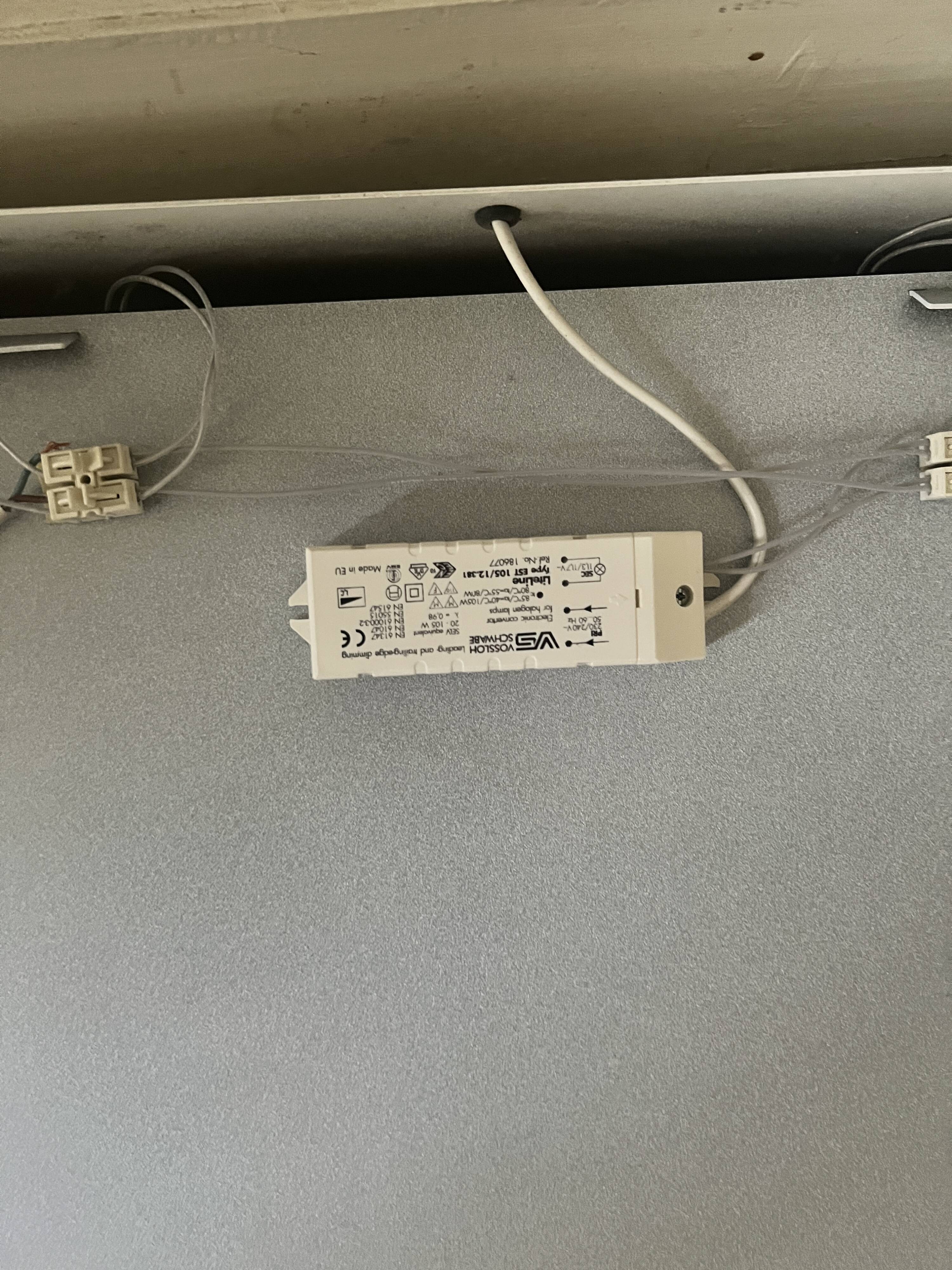 Modernist wall lamp with white metal shade, design by C. Grandidier.