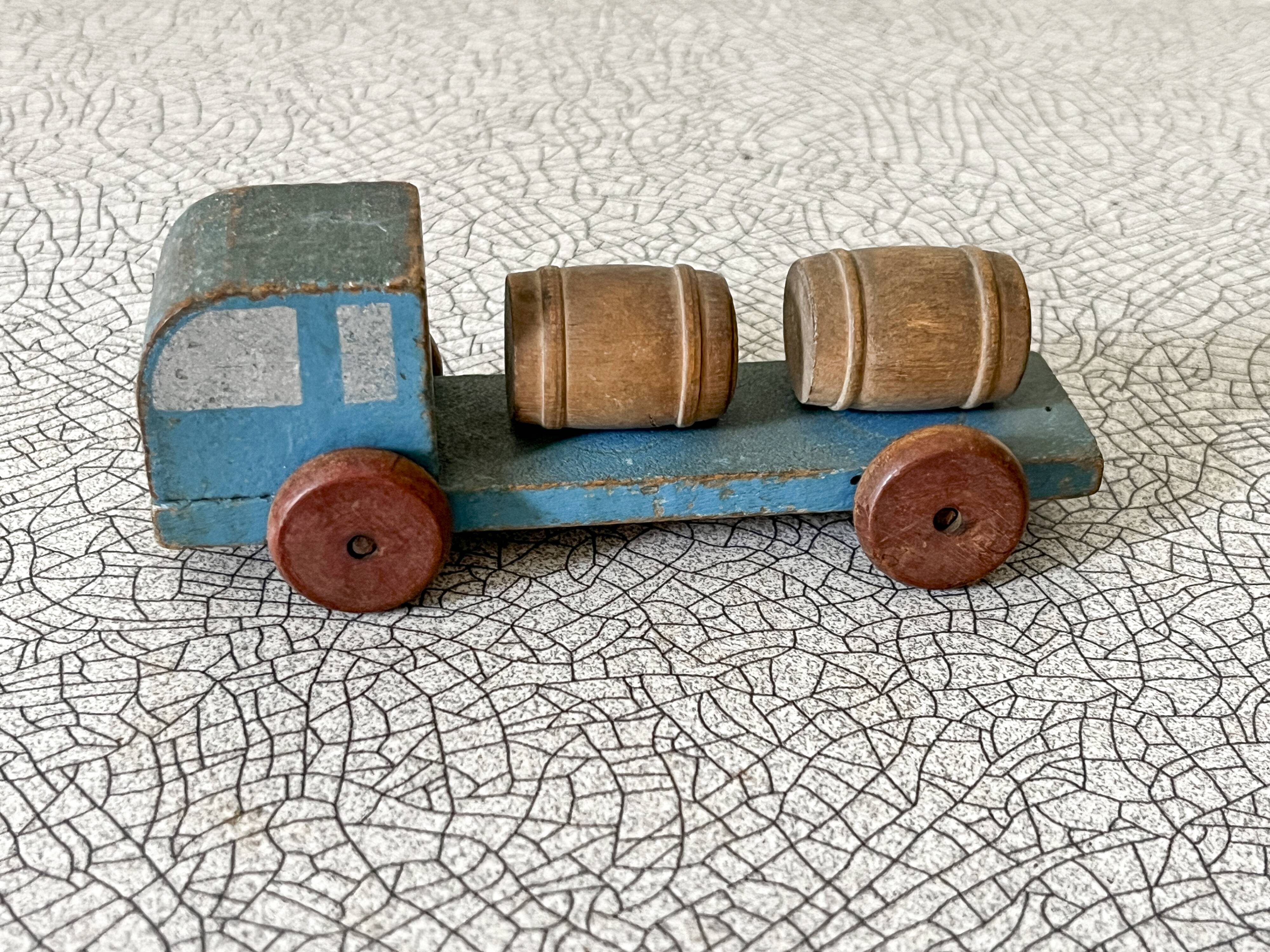 Small barrel transporter truck, antique waxed wooden toy