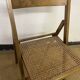 Chaise pliante en bois et cannage vintage