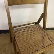 Vintage wooden and cane folding chair
