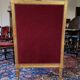Golden wooden bergère in Louis XVI style upholstered in Bordeaux velvet.