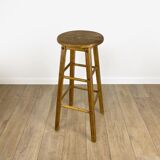 Round vintage wooden bar stool