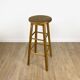 Round vintage wooden bar stool