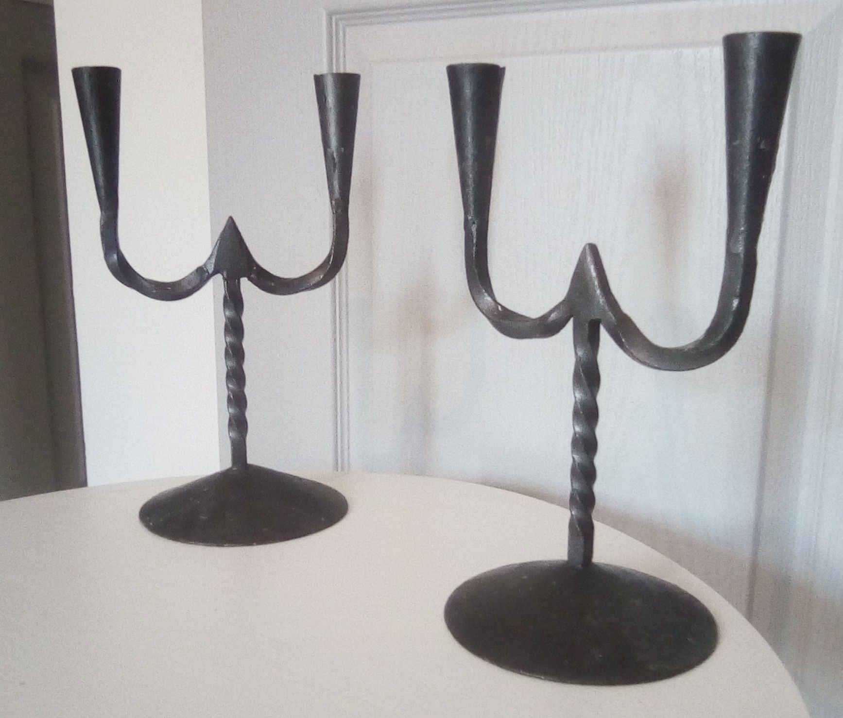 Pair of ancient wrought iron chandeliers in medieval high era 17th century