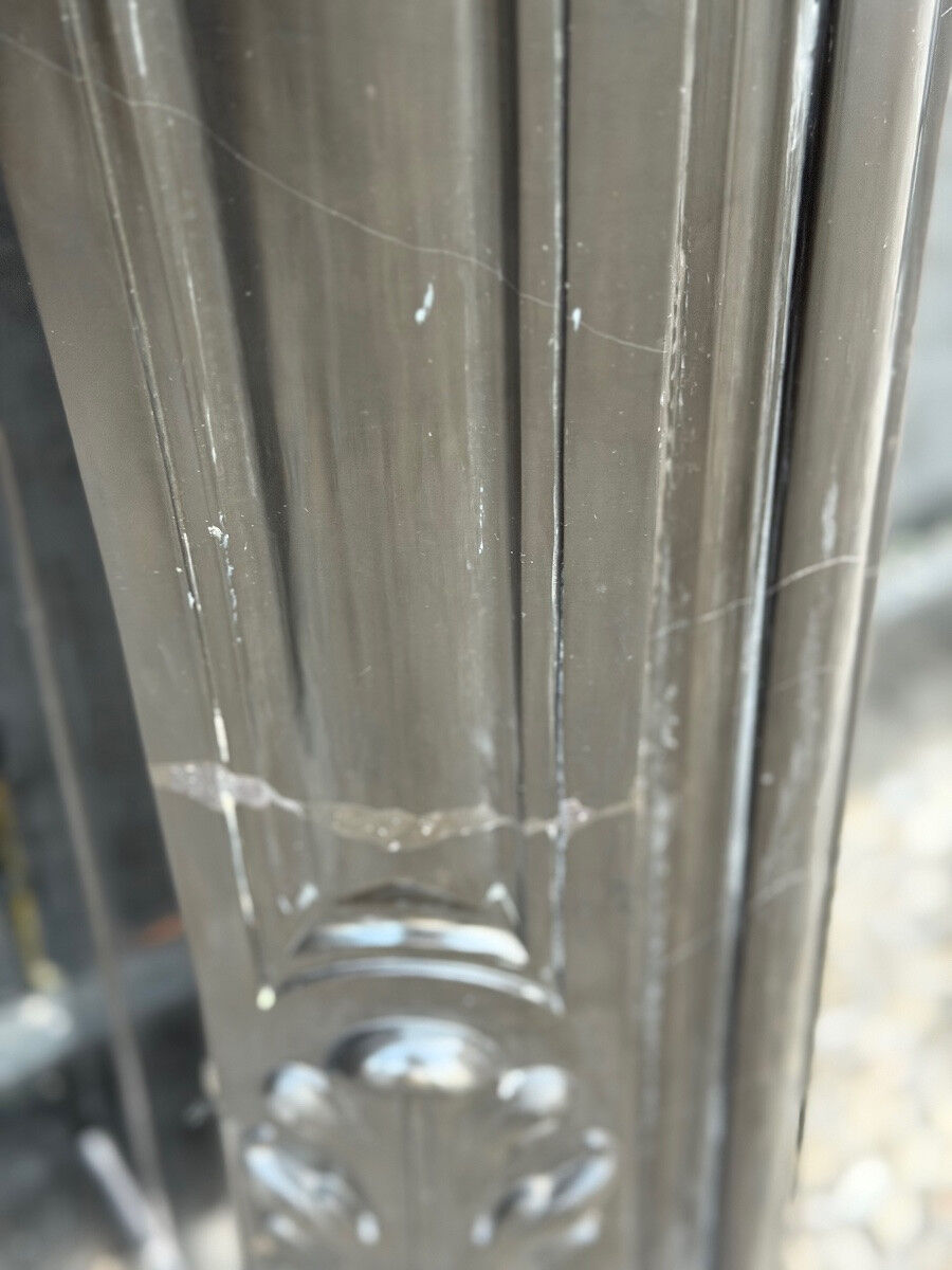 Louis XV style fireplace in black Belgian marble, circa 1880.