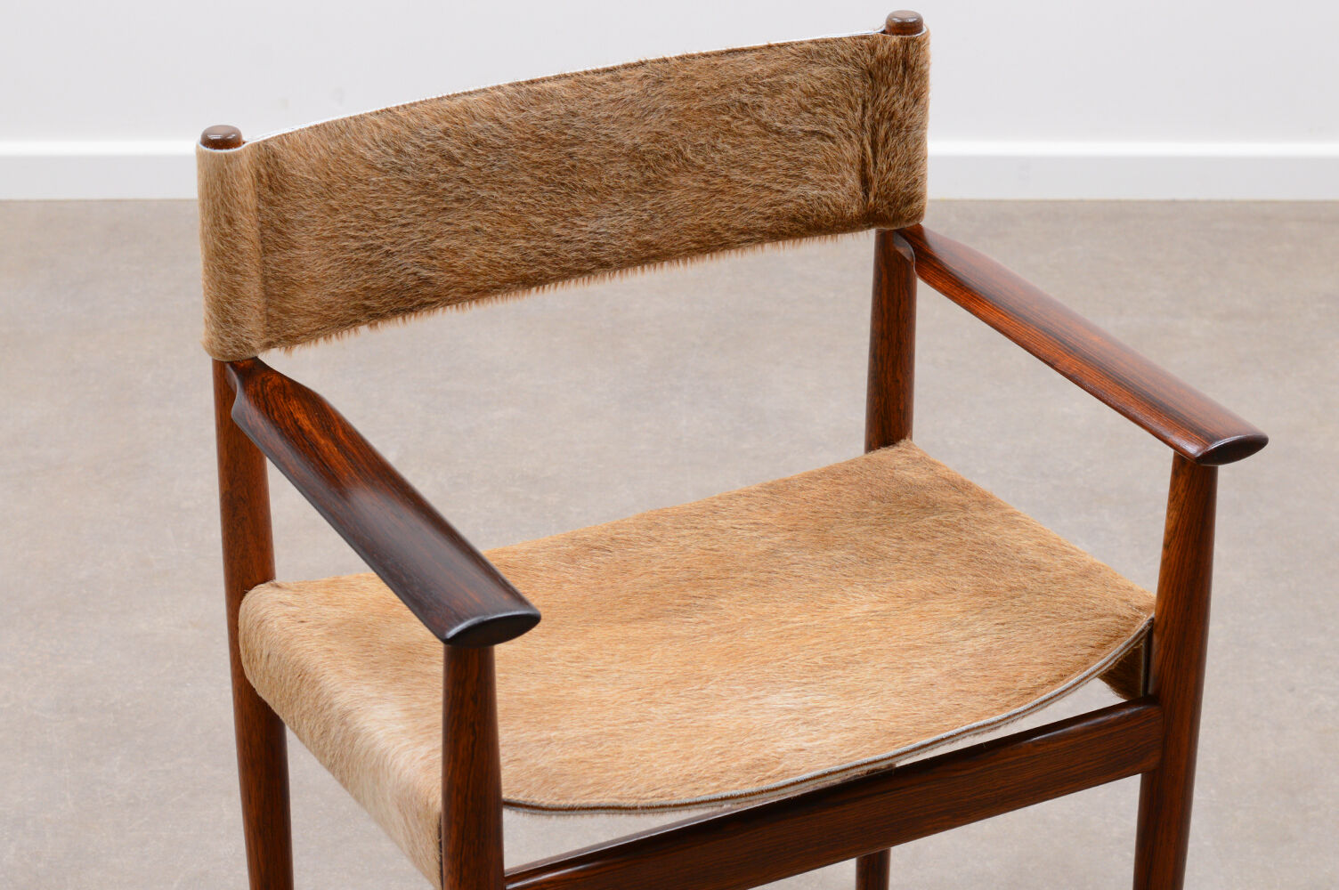 Rosewood and cow hide chair by Kurt Østervig for Sibast, 60s Denmark.