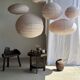 Average suspension in rattan and natural linen, round Japanese style, pink D40.