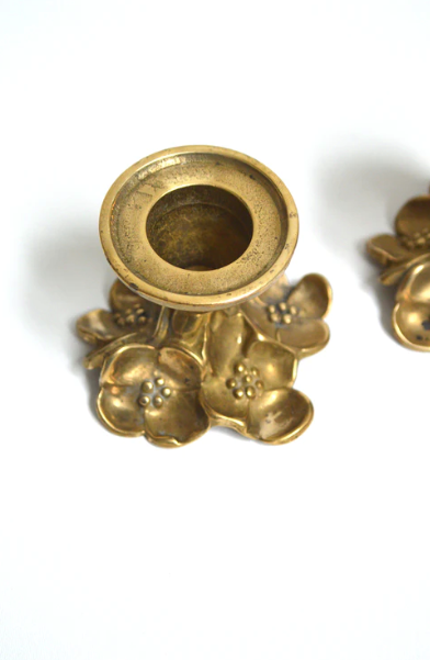 Duo of brass candle holders