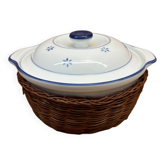 White tureen with wicker basket