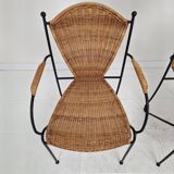 Pair of wicker and iron armchairs by Frederic Weinberg, United States, 1950s.