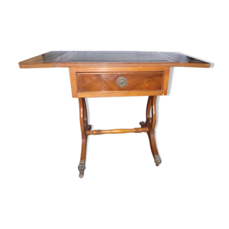 Old wood game table and ornamented green leather