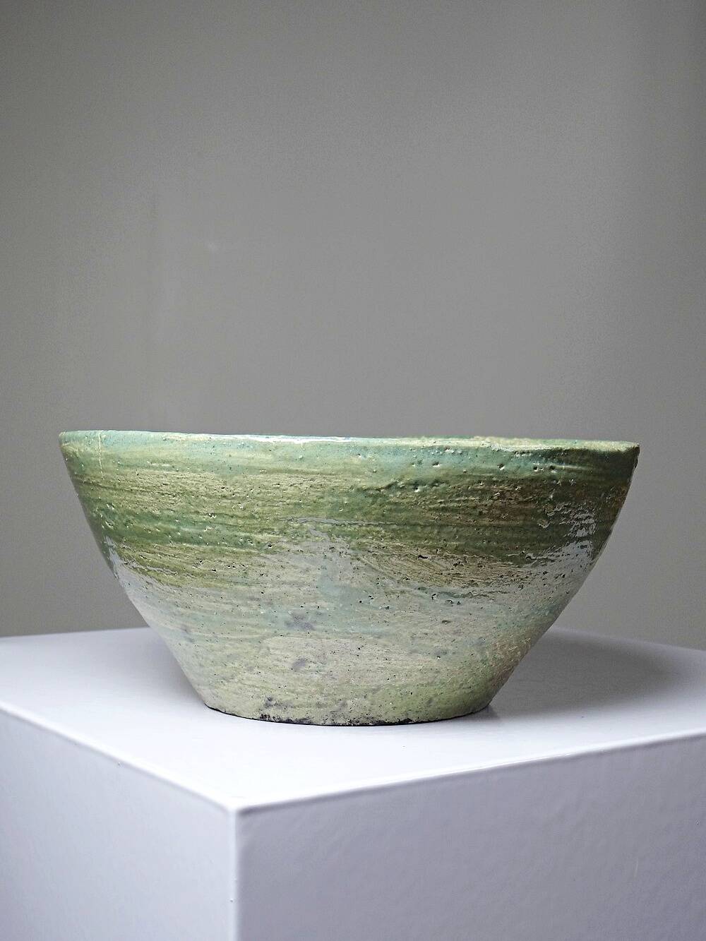 Wabi-Sabi handcrafted ceramic bowl in celadon green, 20th-19th century.