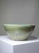 Wabi-Sabi handcrafted ceramic bowl in celadon green, 20th-19th century.
