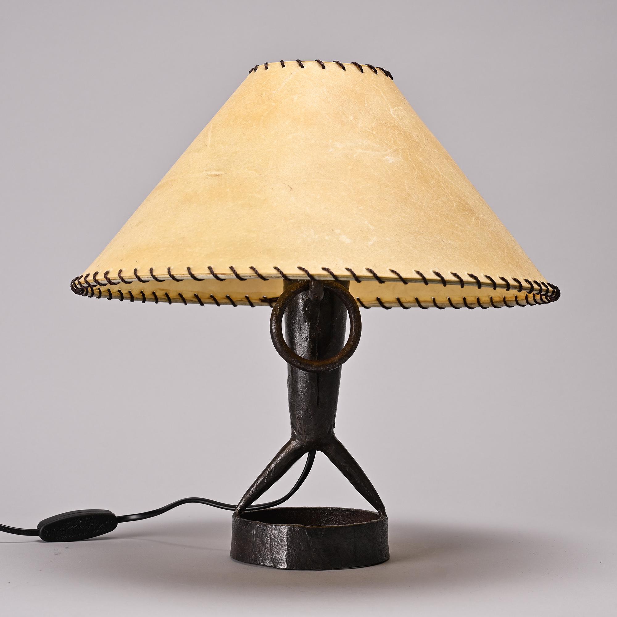 Table lamp in hammered iron by Léopold Gest, France, circa 1970.