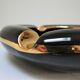 Black ceramic ashtray and vintage gold 50/60