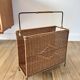 large wicker / rattan and black iron magazine rack from the 70s
