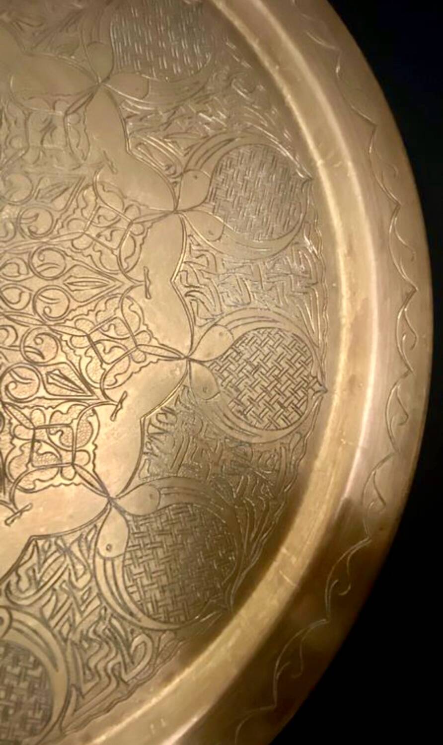 Old oriental tray in yellow copper