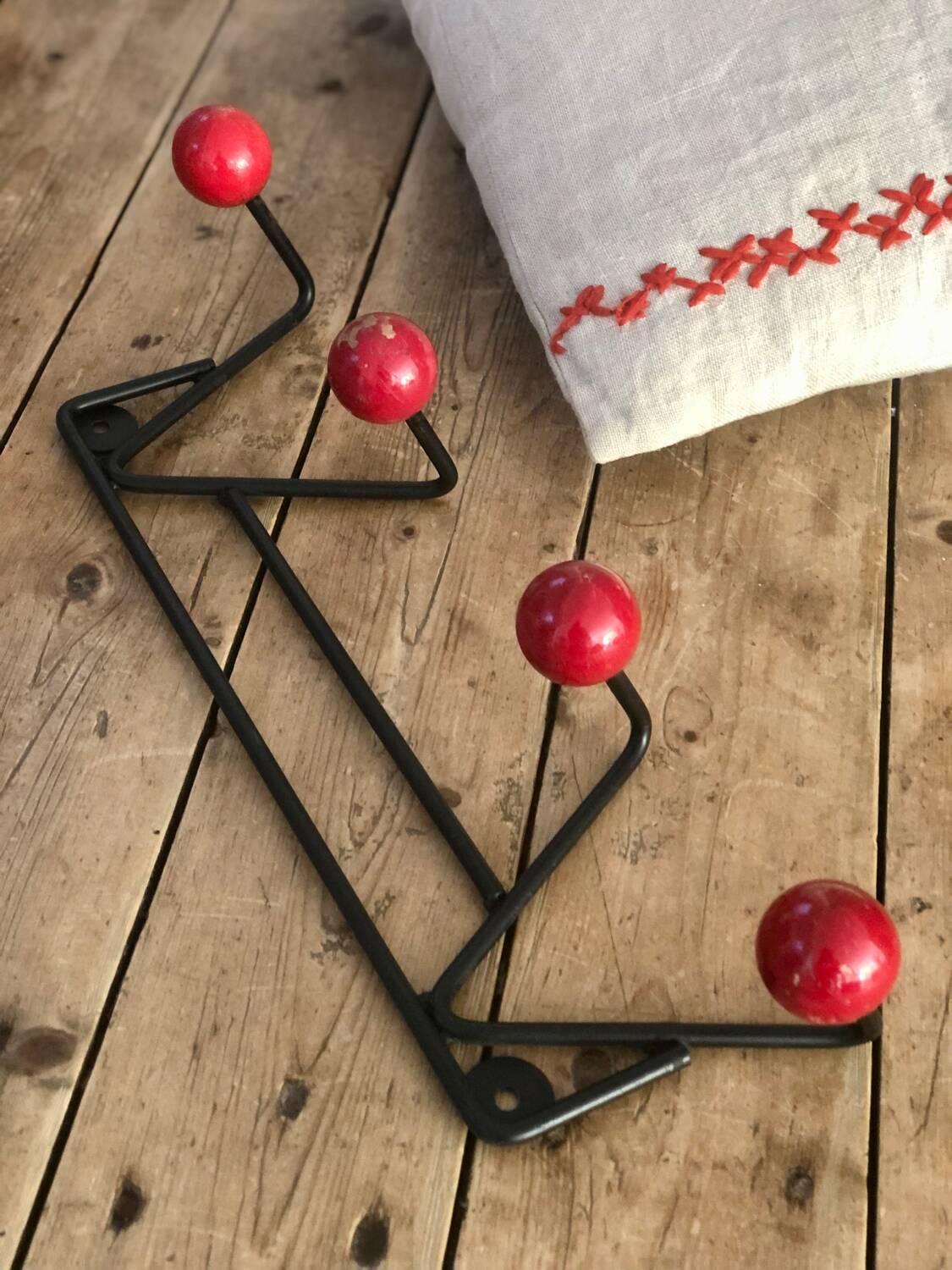 Red and black coat rack